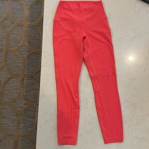 Lululemon size 4 wonder under pant 25” color- orange pink